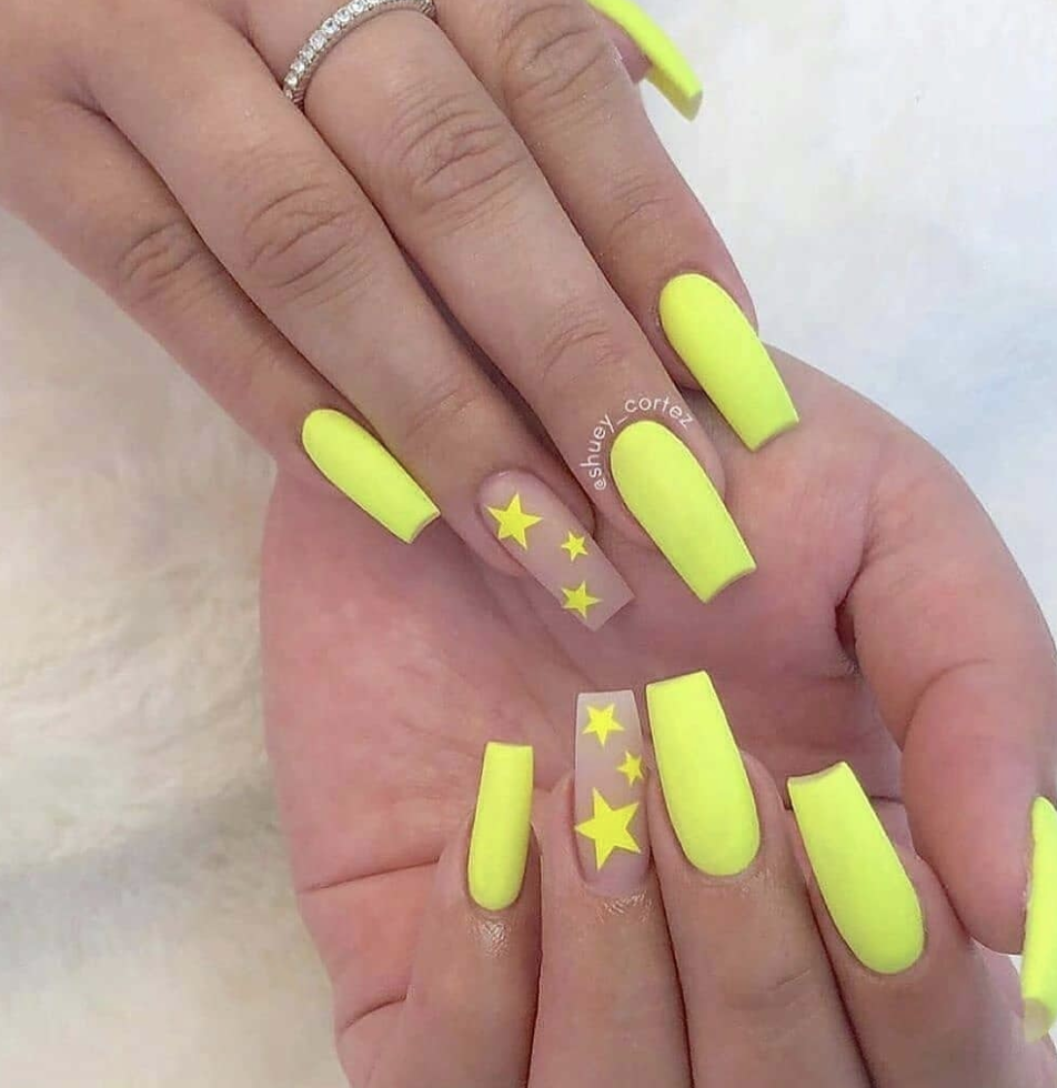 Neon Yellow nails with stars