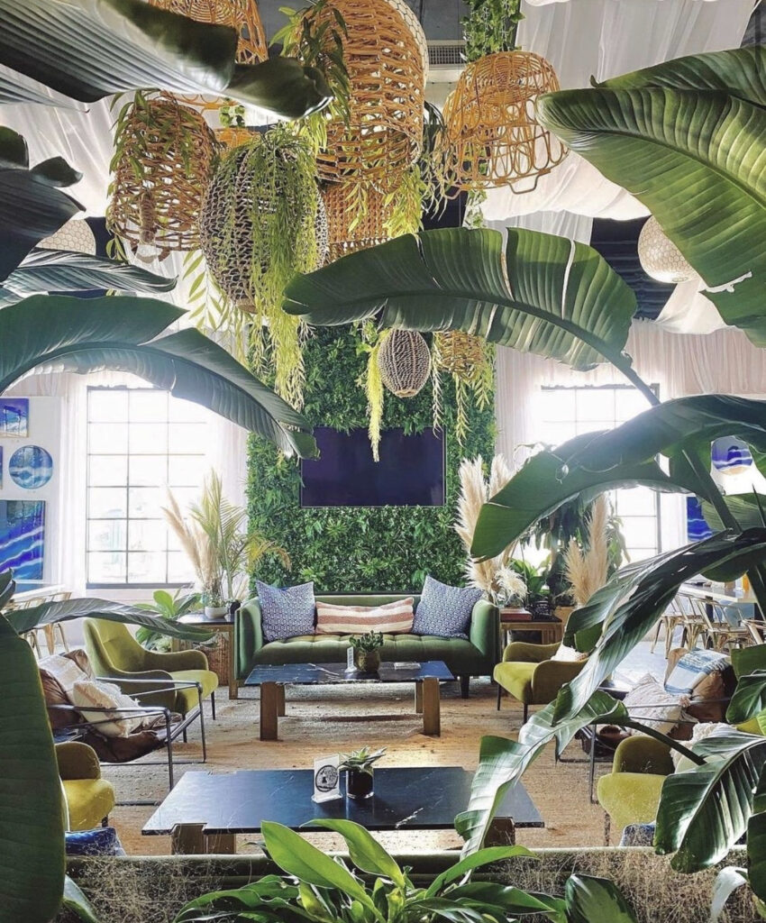 This Jungle-Like Living Room with a Greenery Wall