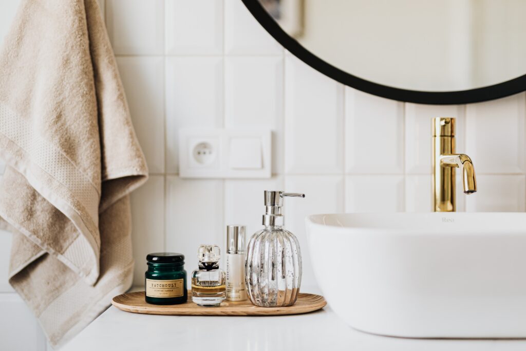 Bathroom with subway tile and gold hardware