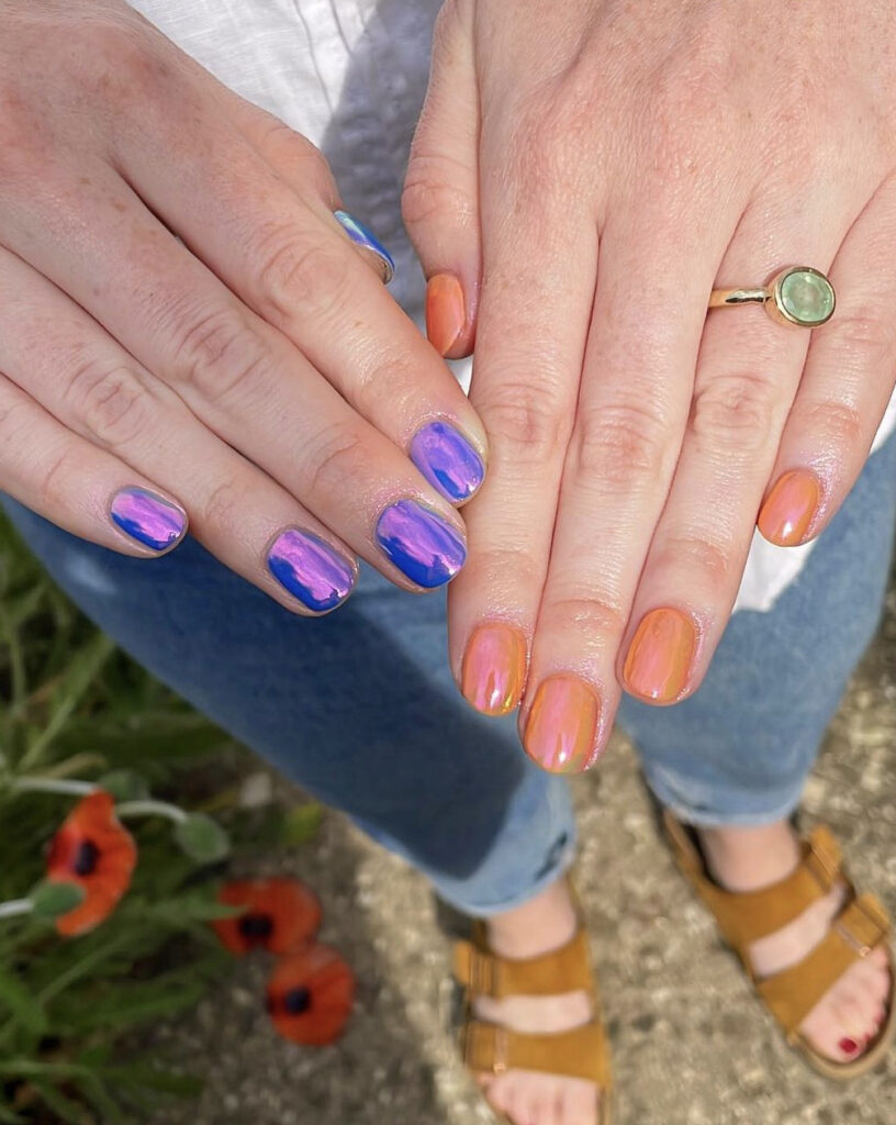Orange and purple two toned chrome nails