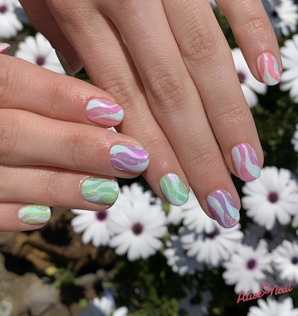  Iridescent glitter and white swirl pastel nails