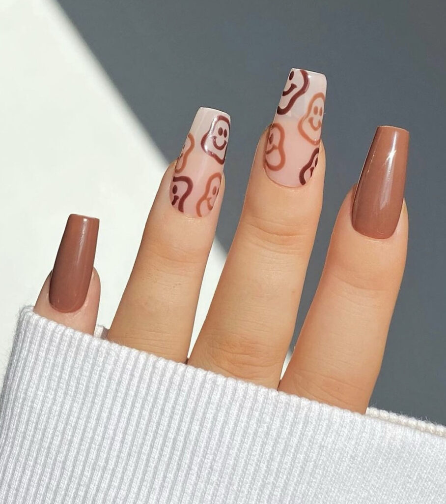Brown Squiggly Smileyfaces on Matte Nails
