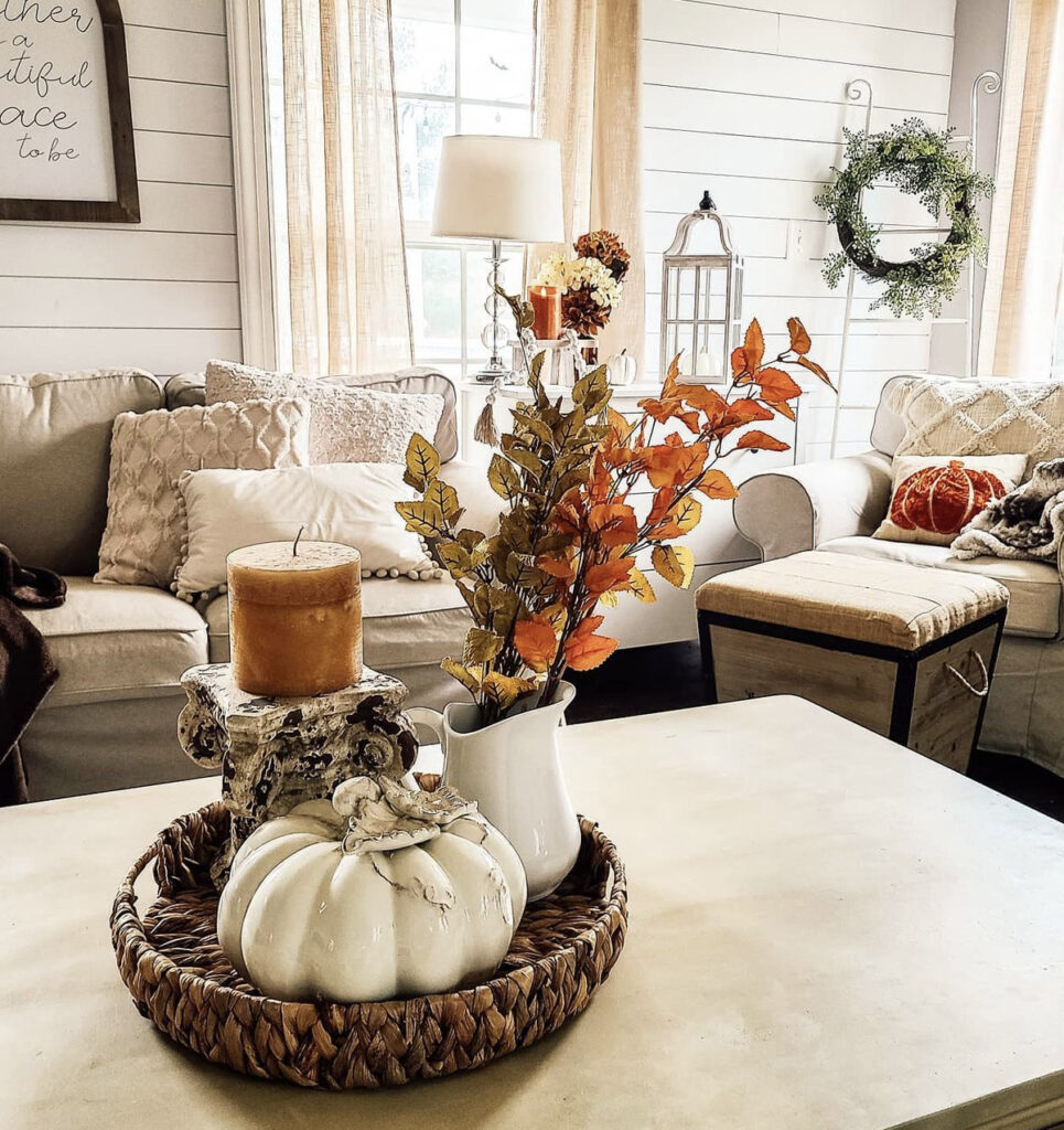 Fall Living Room with Pumpkin Pillows and Foliage