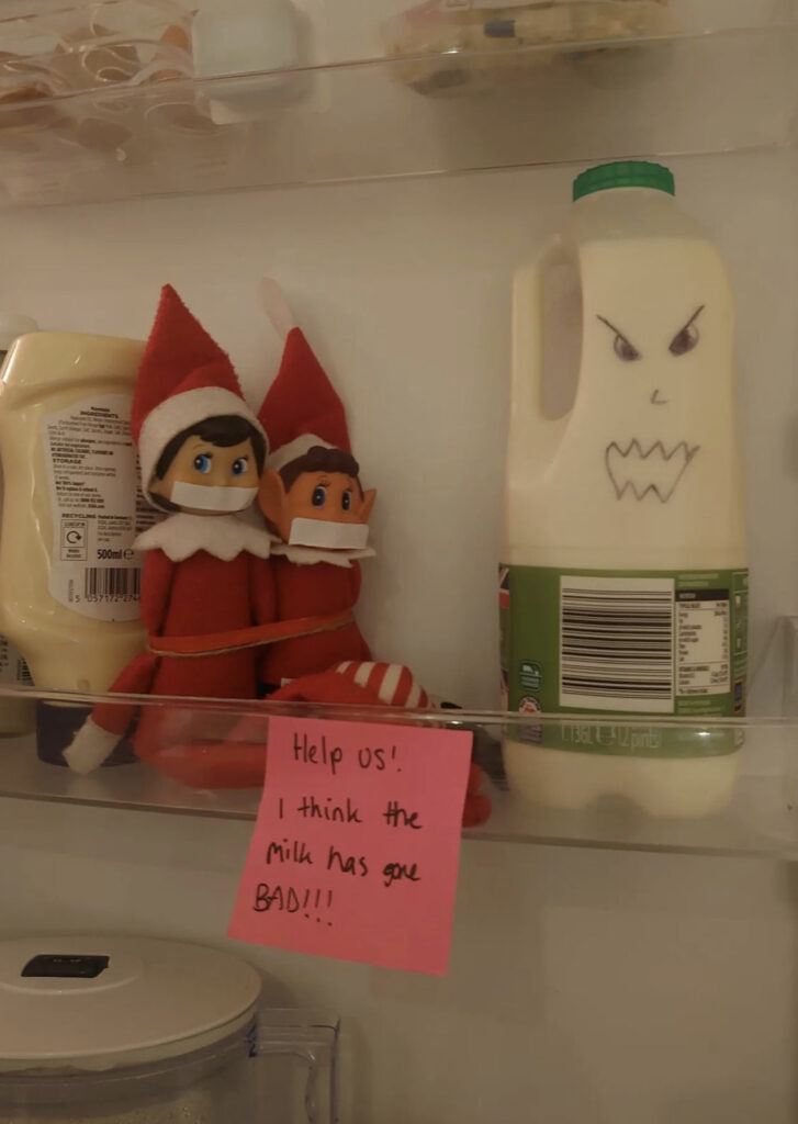 Elf kidnapped in the fridge— “Help us! the milk has gone bad!”