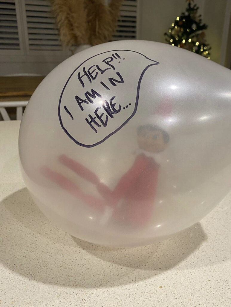 “Help!” Elf trapped in a balloon