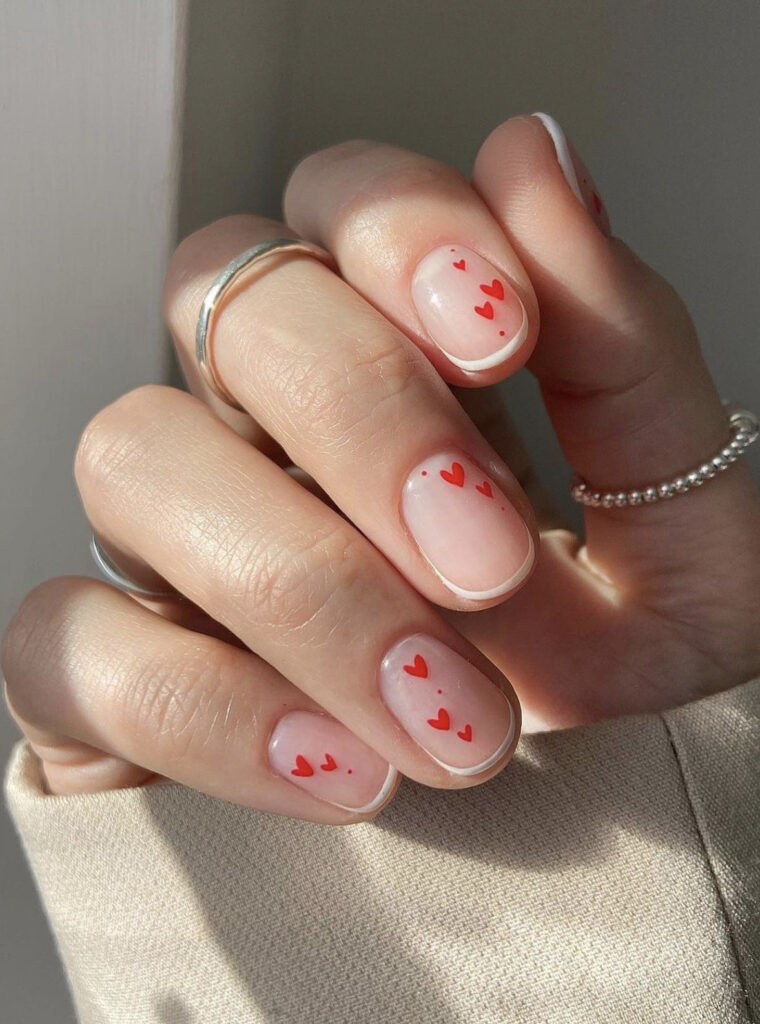 Minimalist Valentine’s Nails with Subtle Tips & Tiny Hearts