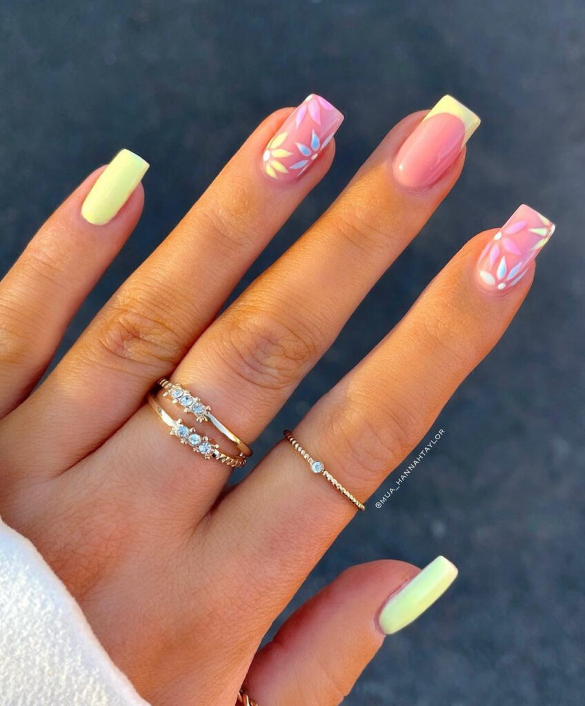 Nude square nails with pastel daisies & light yellow tips