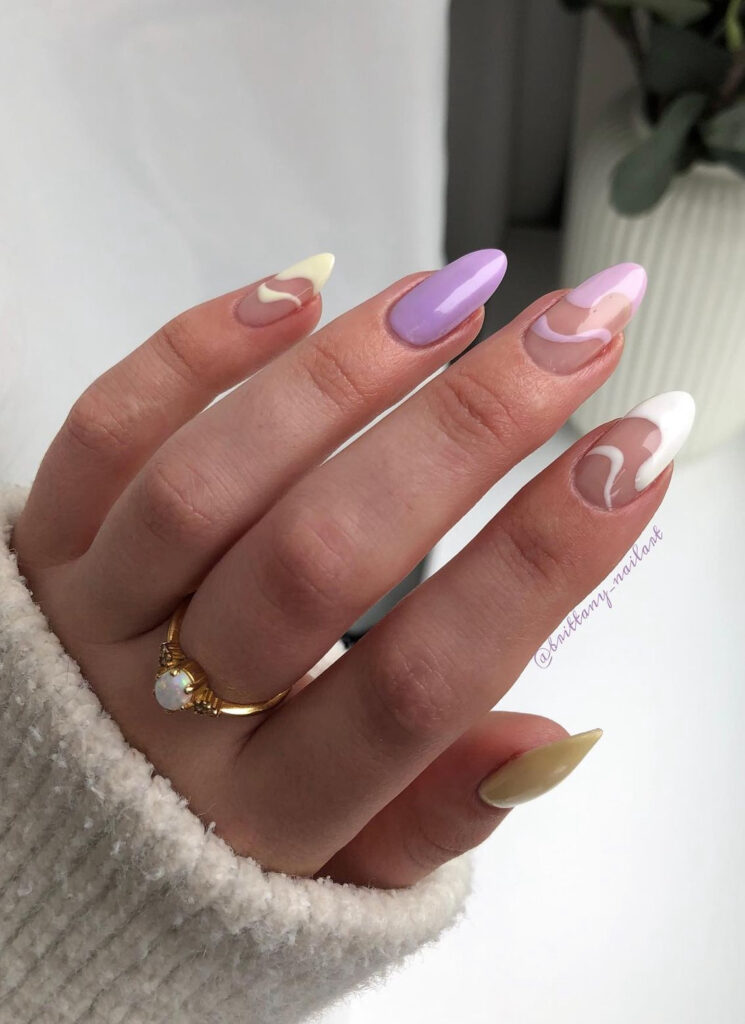 Purple & yellow wavy line art nails