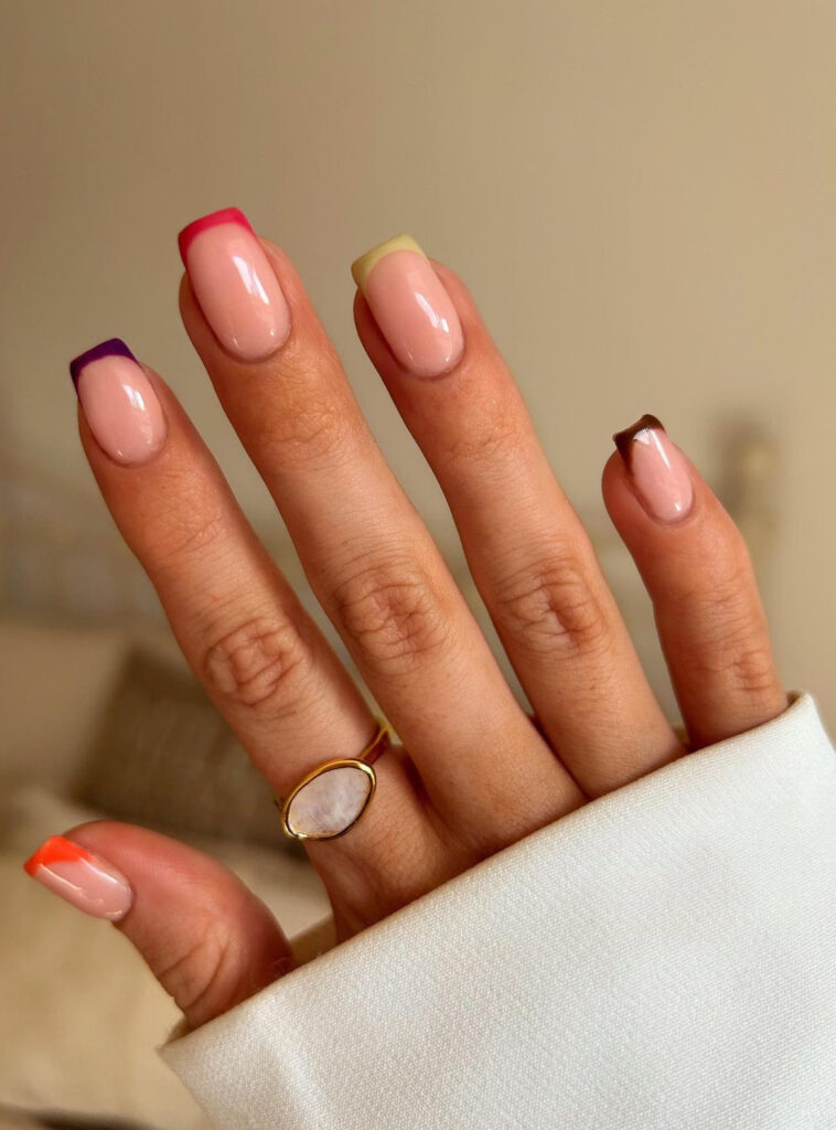 Square nails with delicate pink, yellow, orange, & burgundy tips